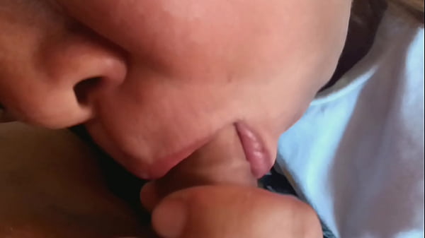 A blonde girl is trying her best to satisfy a Giant's Dick